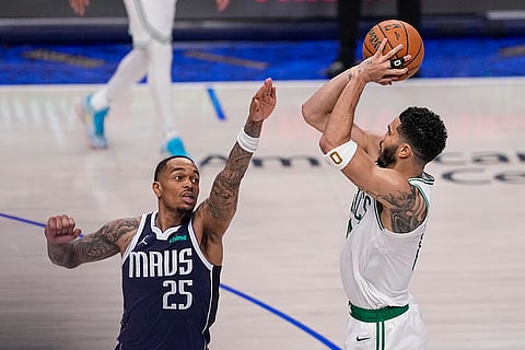 Jayson Tatum shoots against Dallas Mavericks